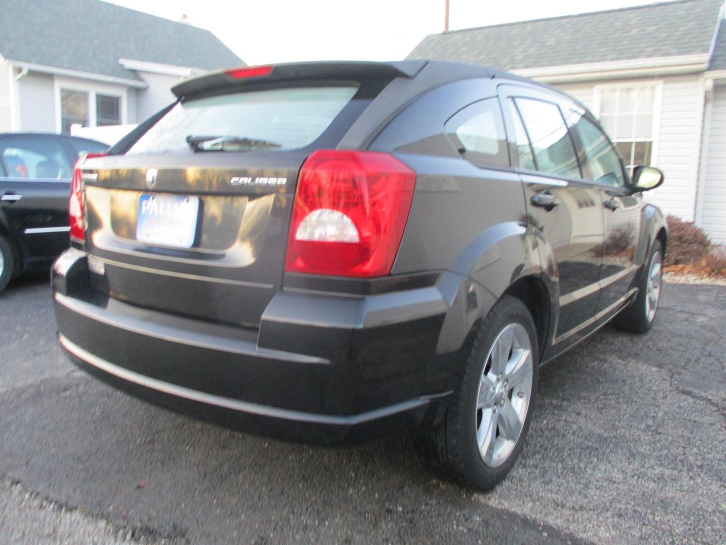 2011 BLACK Dodge Caliber Uptown (1B3CB9HB0BD) with an 2.4L L4 DOHC 16V engine, Continuously Variable Transmission transmission, located at 540a Delsea Drive, Sewell, NJ, 08080, (856) 589-6888, 39.752560, -75.111206 - Photo#5